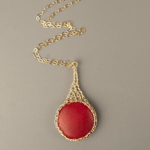Large round RED Howlite pendant necklace, nested in gold wire crochet - Yooladesign