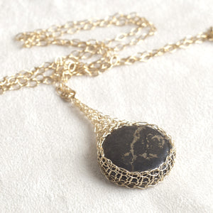 Large round Pyrite pendant necklace, nested in gold wire crochet - Yooladesign
