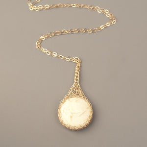 Round IVORY Howlite pendant necklace, nested in gold wire crochet - Yooladesign