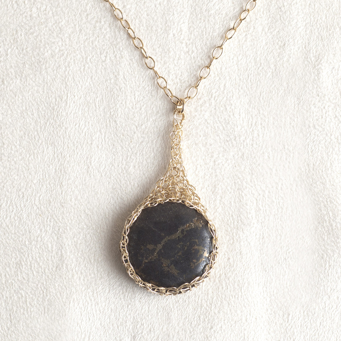 Large round Pyrite pendant necklace, nested in gold wire crochet - Yooladesign